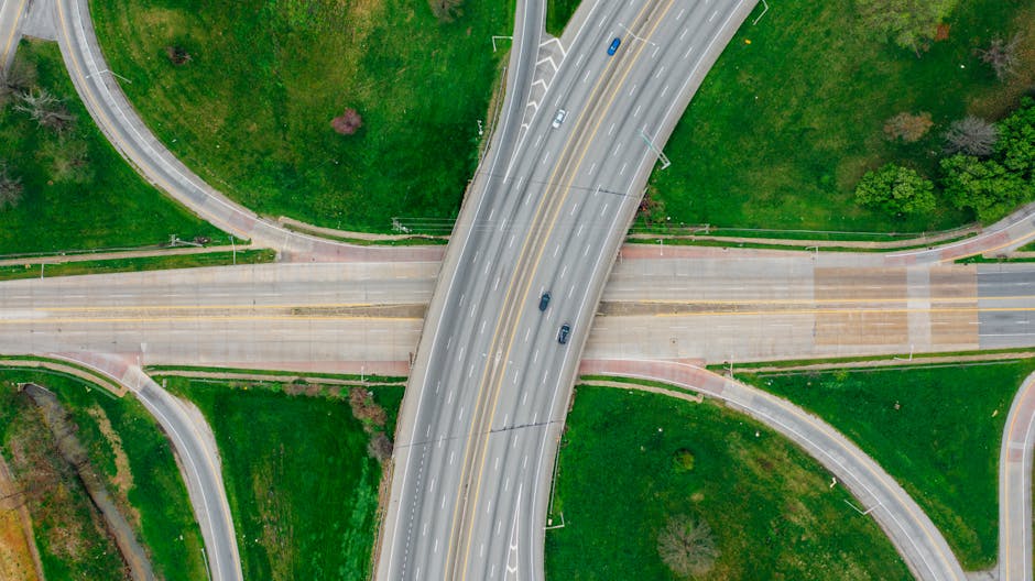 An intricate highway interchange seen from above, symbolizing complex and well-planned roadway coverage.